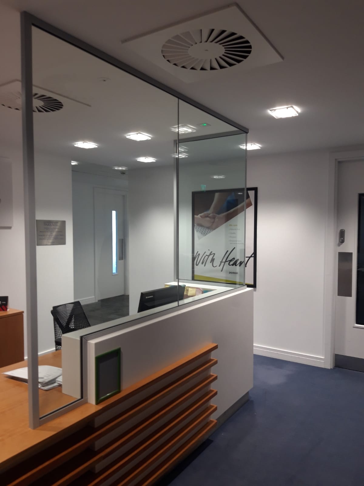 High-spec drop ceiling refurbishment with smooth drywall perimeter bulkheads