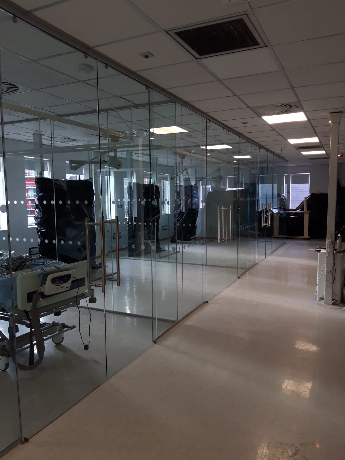 Frameless glass partitions and acoustic ceiling installation for Dublin office